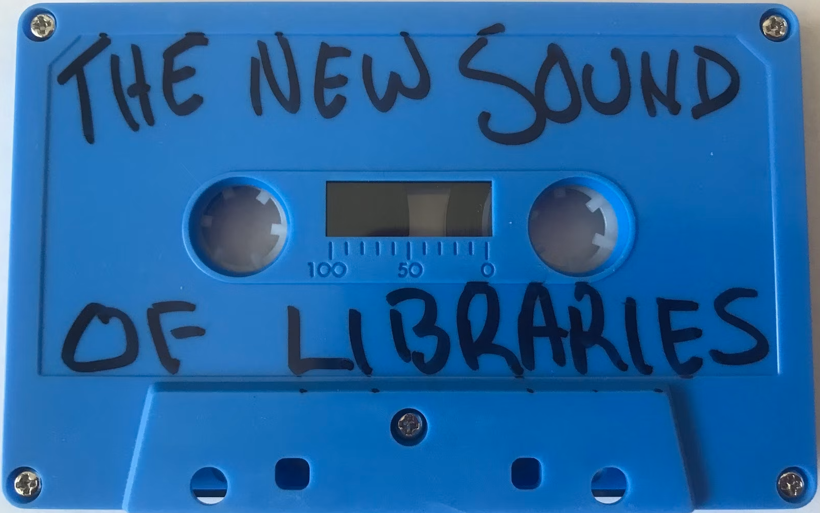 Blue Cassette Tape with The New Sound of Libraries written on it in black marker